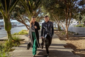 128132-female-and-male-delegates-walk-to-meeting-web-optimised-2560px-webp