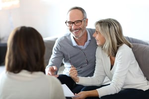 Couple meeting lawyer to discuss estate planning